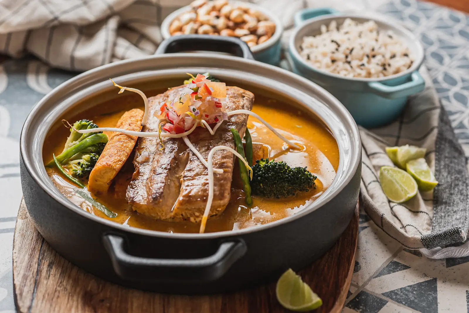 Fish curry with rice, lime and nuts